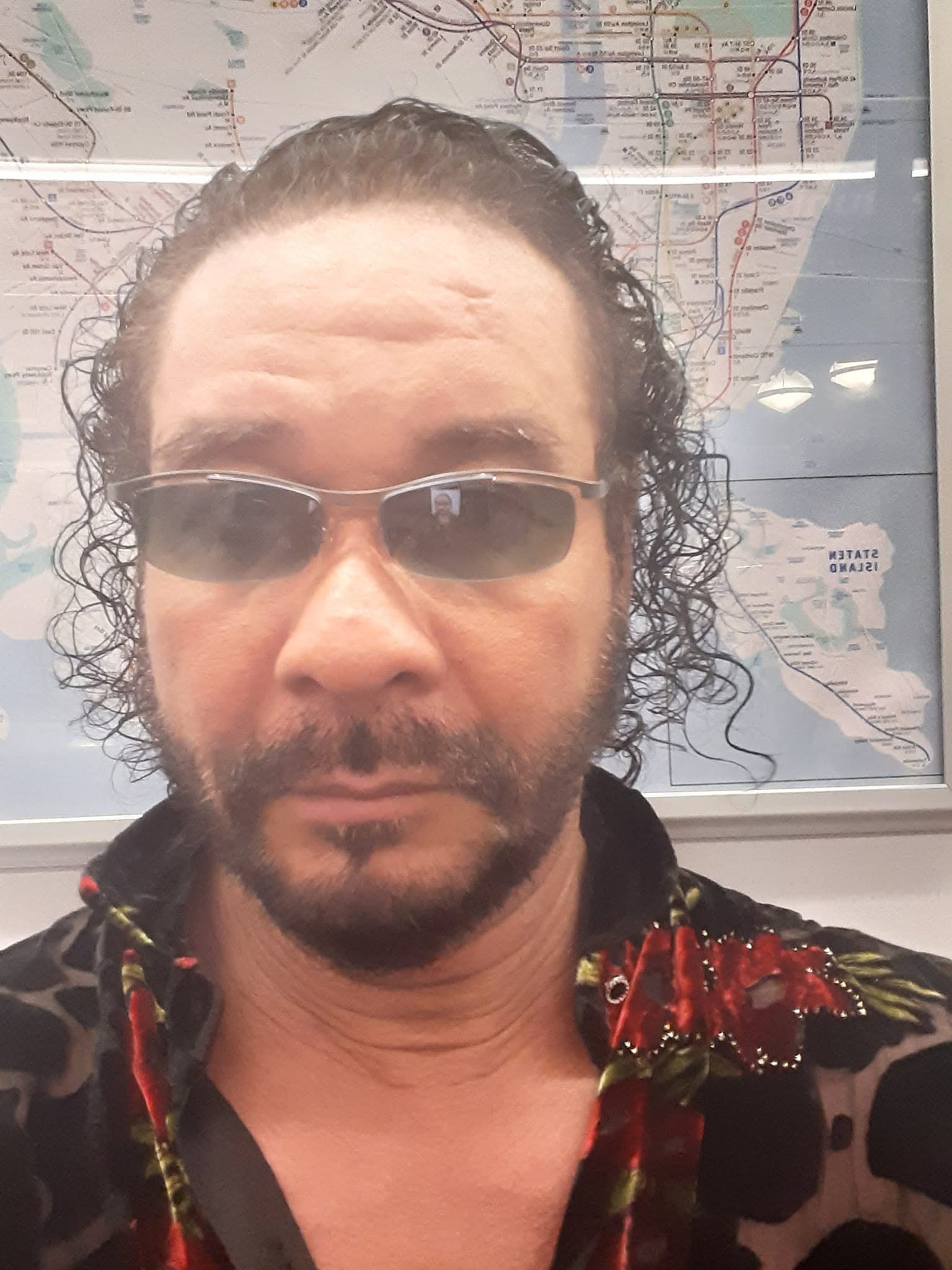 Julian Alexander in front of a transit map